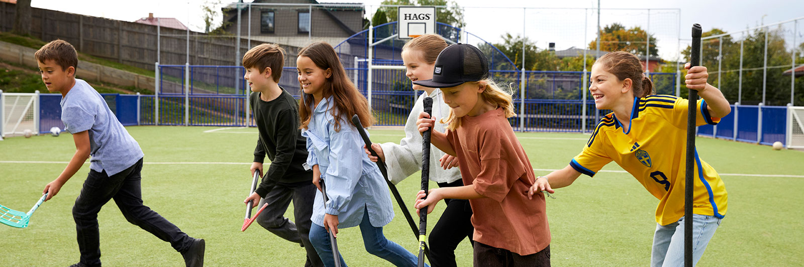 Children playing floorball at a public multi use games arena.